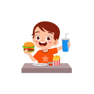 Küçük çocuk hamburger yer ve mutlu olur.