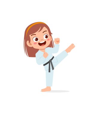 cute little kid training and showing karate pose