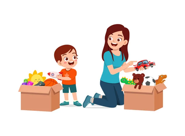 Pequena Criança Colocar Brinquedos Para Caixa Para Doação Com Mãe — Vetor de Stock