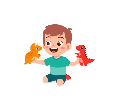 Küçük çocuk dinozor oyuncağıyla oynar ve mutlu olur.