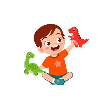 Küçük çocuk dinozor oyuncağıyla oynar ve mutlu olur.