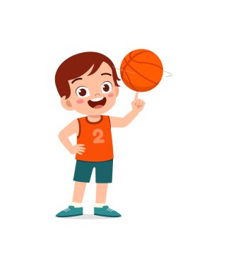Küçük çocuk basketbol oynar ve mutlu olur.