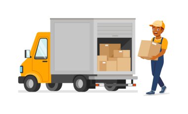 Genç teslimatçı kamyonu doldurmak için kutuyu tutuyor.