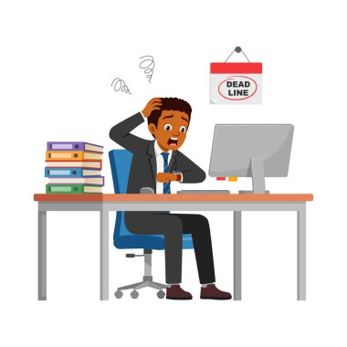 Erkek çalışan masa başında oturuyor ve son teslim tarihinden dolayı panikliyor.