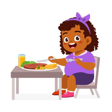 Küçük çocuk et yer ve mutlu olur.