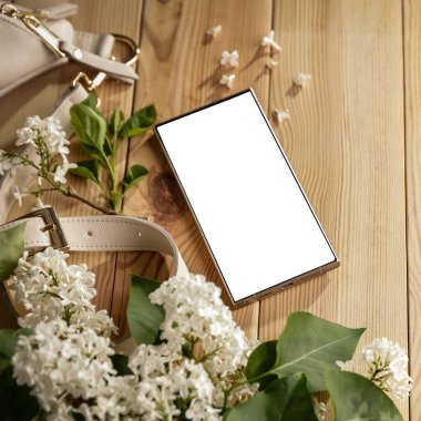 Leziz leylaklar, cep telefonları ve kadın çantası. Anneler Günü için mükemmel bir tasarım. Metin veya ürün için akıllı telefon ekran kopyalama alanı