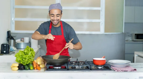 stock image Happy tunisian chef preparing traditional food of restaurant