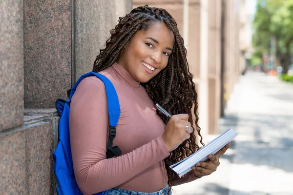 Black Female Student Dreadlocks Writing Notes Front University Building Outdoor — Stock Photo, Image