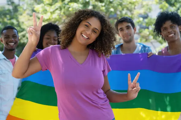 Happy Hispanic Female Young Adult Celebrating Pride Parade Lgbtq Rainbow Stockfoto
