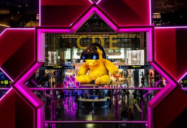 Doha, Qatar, August 20, 2024: An aerial view of Hamad International Airport, a world-class hub for global travel in the Middle East. The airport's sleek, modern design and expansive layout are showcased, highlighting its role as a major transportatio clipart