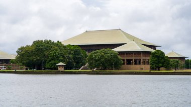 Colombo, Sri Lanka January 20, 2025: A majestic view of the Sri Lanka Parliament, an iconic architectural structure that houses the legislative body, standing as a symbol of the country's political and democratic heritage. clipart