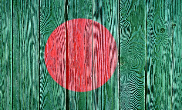 Bangladesh flag painted on old wood plank background. Brushed natural light knotted wooden planks board texture. Wooden texture background flag of Bangladesh