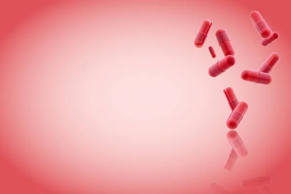red medical gel capsules falling down on red background. food supplement, pharmacy concept. plastick capsules pills