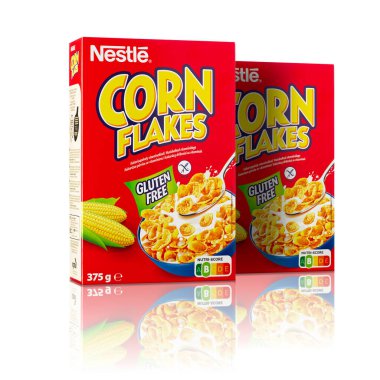 Tallinn, Estonia - January 2023. Nestle Corn flakes breakfast cereal. Red box of popular breakfast corn flakes. Nestle largest food company in the world.