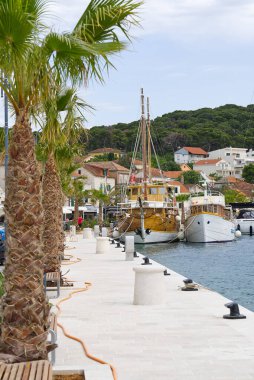 Elegant sailing boat in marina, Yachts and boats docked on pier in yacht in marina. Croatia in summer
