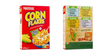 Tallinn, Estonia - January 2023. Nestle Corn flakes breakfast cereal. Red box of popular breakfast corn flakes. Nestle largest food company in the world.