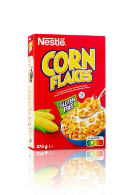 Tallinn, Estonia - January 2023. Nestle Corn flakes breakfast cereal. Red box of popular breakfast corn flakes. Nestle largest food company in the world.