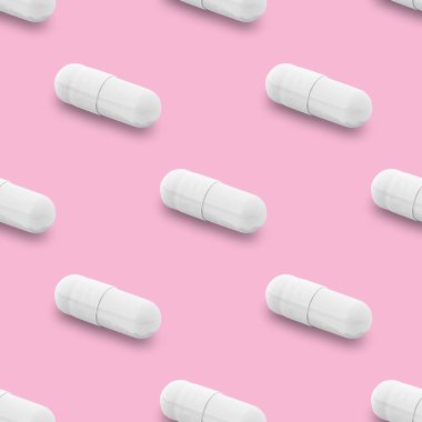 Gel capsule seamless pattern. White capsule shaped medicine. pharmacy concept. food supplement. Capsule pills pattern on a pink background