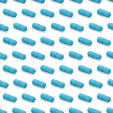 Gel capsule seamless pattern. Blue capsule shaped medicine. pharmacy concept. food supplement. Capsule pills pattern on a white background