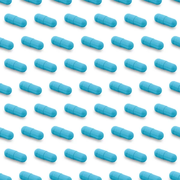 Gel capsule seamless pattern. Blue capsule shaped medicine. pharmacy concept. food supplement. Capsule pills pattern on a white background