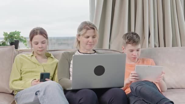 Happy Family Kids Sit Sofa Living Room Have Fun Using — Vídeo de Stock