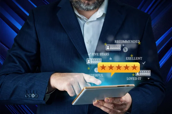 Five stars testimonial. Customer review good rating concept hand pressing five star on digital device screen. Customer feedback testimonial.