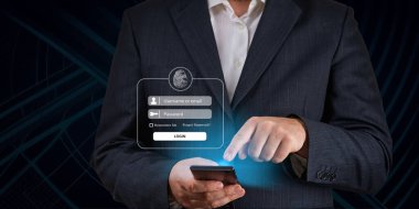 İşadamı akıllı telefonunu kullanarak giriş yapmış. Giriş için kullanıcı ve parolalar için cep telefonu kullanılıyor. Finansal uygulamalara internet erişimi için Siber Güvenlik kavramı