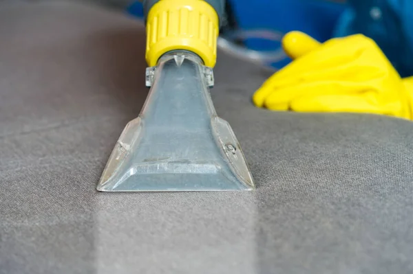 Woman Hand Cleaning Stain On Carpet With hard brush. Orange carpet cleaning.  carpet cleaning service concept Stock Photo by ©FotoPrivet 430094098