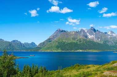 Amazing view at Lofoten islands Austvagoya, Austnesfjorden, Norway. Fjord summer landscape travelers rest area. Nordland, Coastline sea, ocean with mountains in background