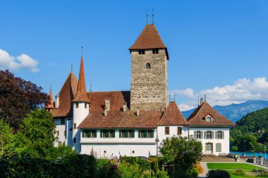 Schloss Spiez, located on a small island in Lake Geneva near Veytaux, Vaud, Switzerland, is a popular tourist destination and one of the most visited castles in Switzerland. clipart