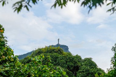 Statue of Christ the Redeemer in Rio de Janeiro, Brazil - January 13, 2023: Statue of Christ the Redeemer seen from Leblon neighborhood in Rio de Janeiro.