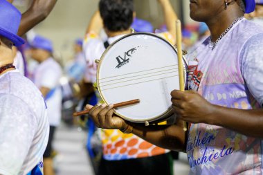 Technical rehearsal of the samba school Arranco do Engenho de Dentro in Rio de Janeiro, Brazil - January 21, 2023: Drums of the samba school Arranco do Engenho de Dentro, on the marques de sapucai in Rio de Janeiro.