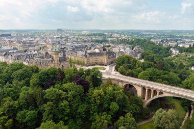 Luxembourg City - LOOK 360 Panorama - Aerial summer view from the 71m-high LOOK UP wheel. Historic buildings, Adolphe Bridge and green parks highlight the charm of the Grand Duchy's capital.