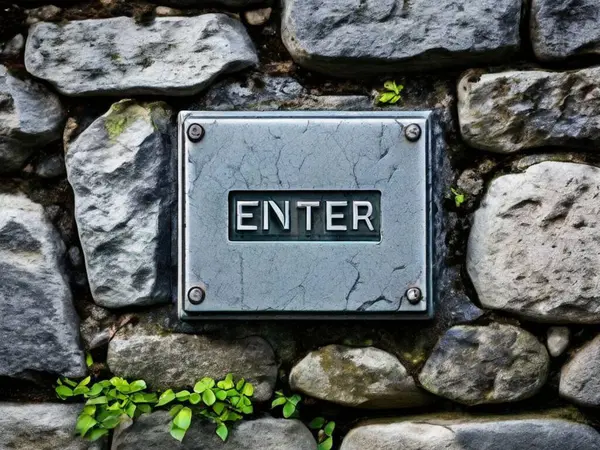 Enter button on a red stone wall.