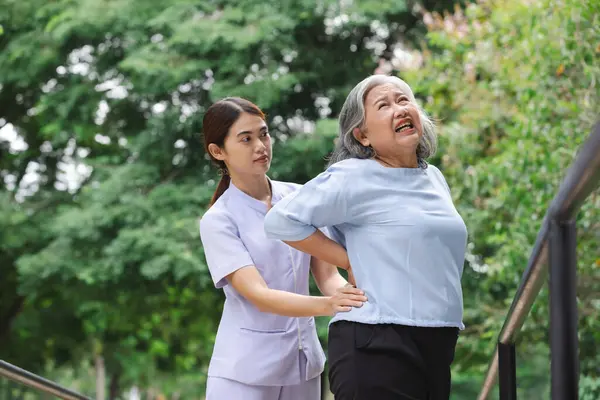 asian old female patient, doctor, and elderly senior woman, healthcare concept
