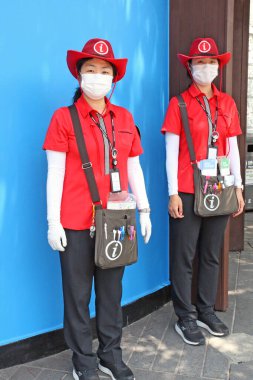 Seoul, South Korea - June 15,2023: These two girls as Information Guides for tourists, specifically here near the Imperial Palace in Seoul, South Korea on June 15,2023 clipart