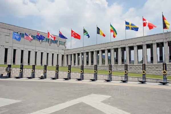 stock image Seoul, South Korea - June 13,2023: - War Memorial of Korea-flanking the facade of the main buiding are rows of black marble monuments inscribed who died during the Korean, Vietnam War in Seoul, South Korea on June 13,2023