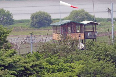 DMZ, South Korea - June 07,2023: A military observation post in the DMZ on the world's most guarded border between North and South Korea in DMZ, South Korea on June 07,2023 clipart