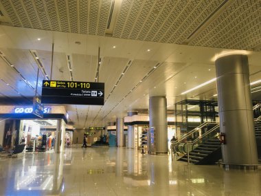 Gate Number Direction Signage at Departure Hall of New Terminal Extension at Rajiv Gandhi International Airport - Hyderabad,  India on 26th January 2025 - Stock Image as JPG File clipart