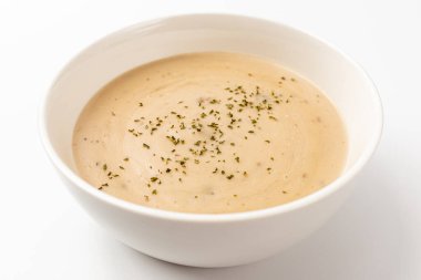 Mushroom cream soup on a white background