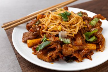 Bean sprouts bulgogi on a white background