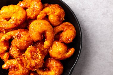 Shrimp gangjeong, fried shrimp mixed with spicy and sweet sauce