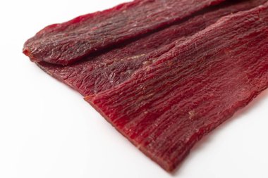 Beef jerky on a white background