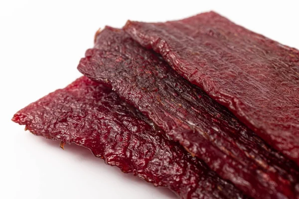 Beef jerky on a white background