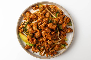 Beyaz arka planda Whelk ve Sebze Baharatı