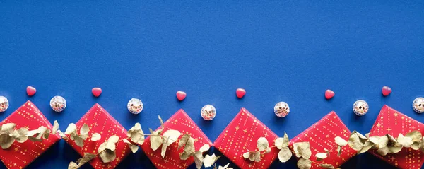 Wintertime Blue Red Decorative Border Gift Boxes Disco Balls Eucalyptus — Zdjęcie stockowe