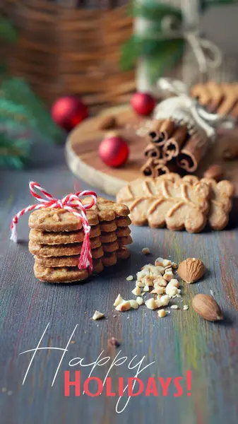 Almond cookies with cinnamon sticks, clovers, almonds, Christmas tree twigs. Winter sweets.