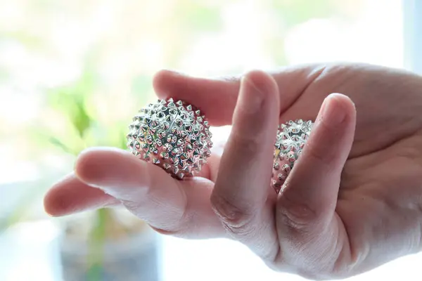 Silver Metal Magnetic Balls Female Hand Spiky Tool Hand Massage — Stock Photo, Image