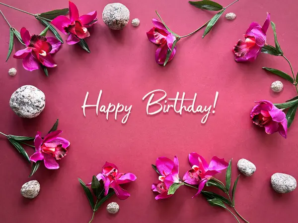 Happy Birthday Vibrant Orchids Stones Pink Background Festive Greeting Design Fotografie de stoc