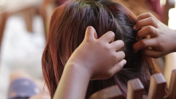 Girl Inspecting Hair Lice — Stock Video